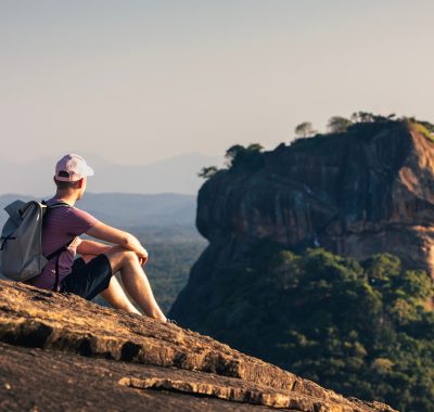 Traveler enjoying view of Sigiriya rock in Sri Lanka